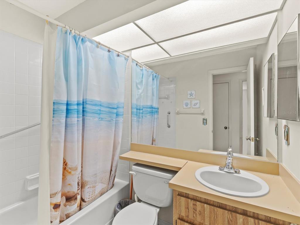 7415 Heather Walk Drive Weeki Wachee, FL 34613 - Photo 12 of 35 a bathroom with a sink toilet and shower