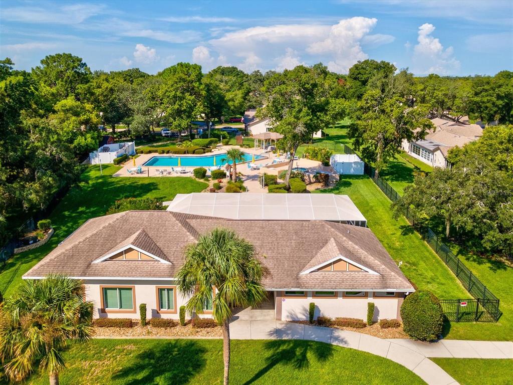 7415 Heather Walk Drive Weeki Wachee, FL 34613 - Photo 28 of 35 an aerial view of residential houses with outdoor space and trees