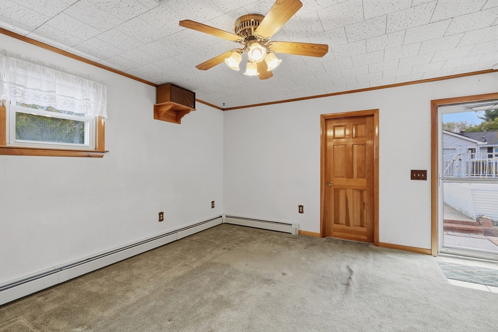 10 Deluca Road Milford, MA 01757 - Photo 19 of 37 an empty room with closet and fan