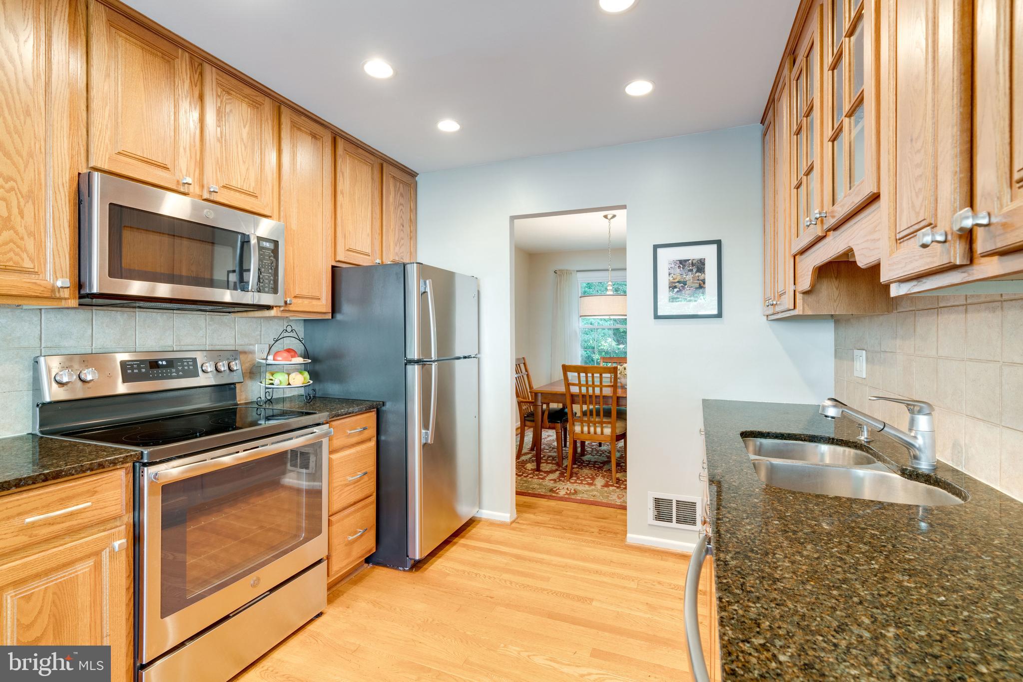 8315 Cushing Court Springfield, VA 22153 - Photo 3 of 59 stainless steel appliances and granite countertops