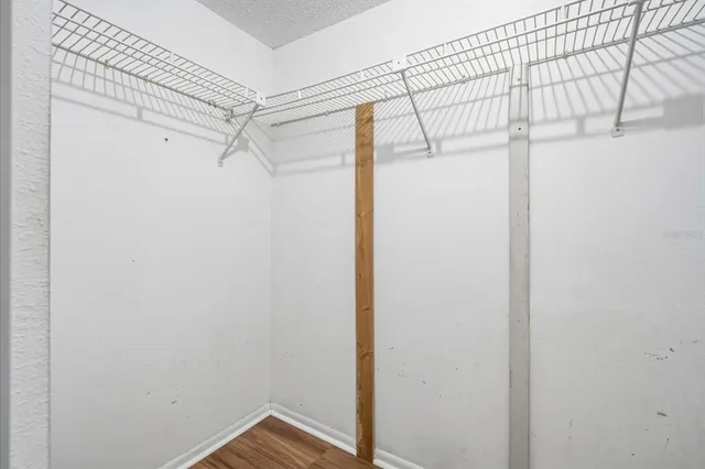 a view of a room with racks on the wall