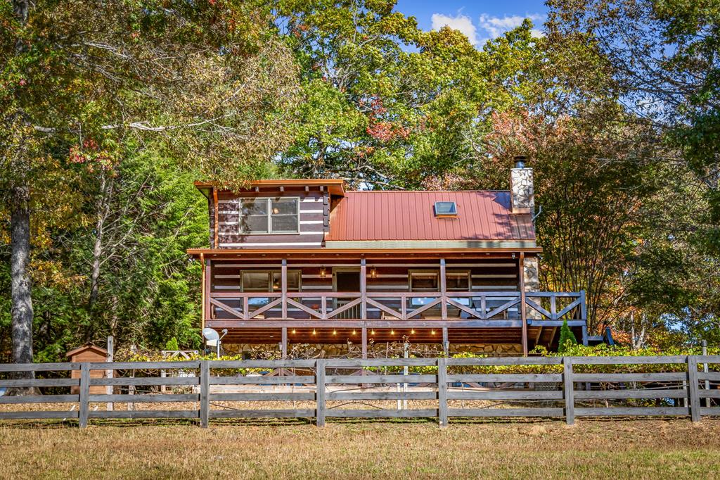 212 Dogpatch Lane Blue Ridge, GA 30513 - Photo 3 of 70 a view of a house with wooden stairs