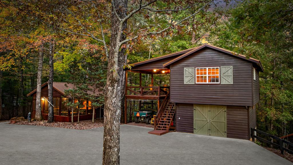 212 Dogpatch Lane Blue Ridge, GA 30513 - Photo 45 of 70 a front view of a house with a yard