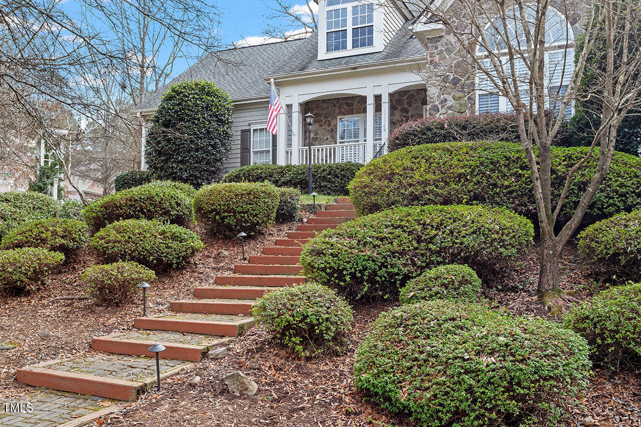 1121 Coram Fields Road Wake Forest, NC 27587 - Photo 3 of 3 a view of a garden with pathway
