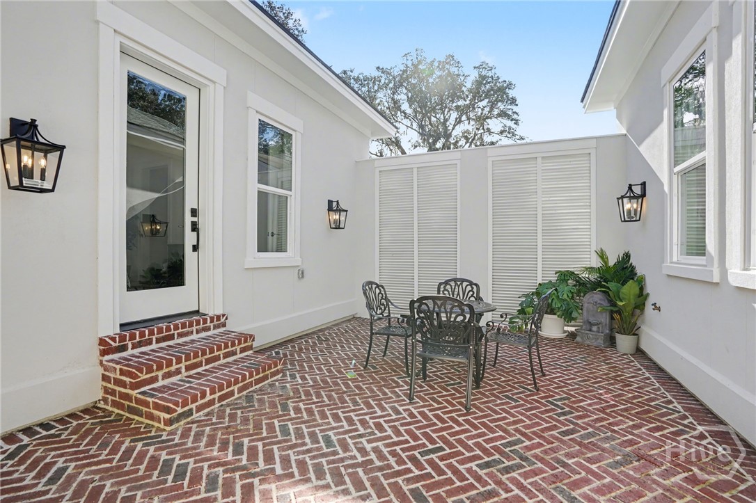 2 Top Gallant Circle Savannah, GA 31411 - Photo 27 of 40 Main Level Courtyard showing access to Main Level Guest Suite