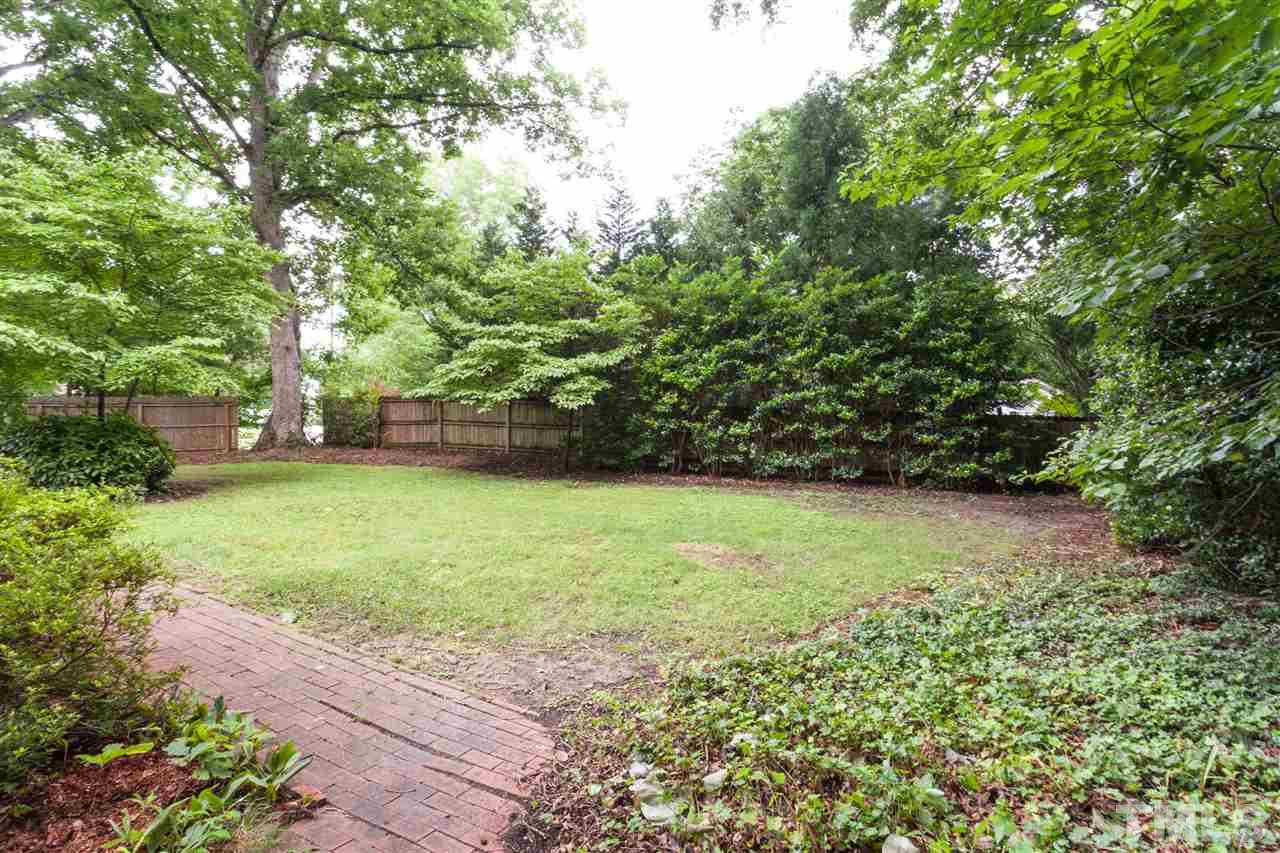 308 East Rowan Street Raleigh, NC 27609 - Photo 22 of 23 a view of a yard with a tree