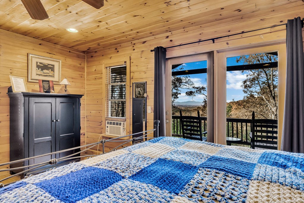 116 Channing Ridge Road Morganton, GA 30560 - Photo 16 of 62 a bedroom with a bed and a window