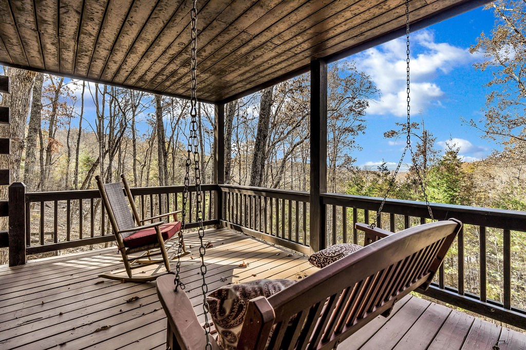 116 Channing Ridge Road Morganton, GA 30560 - Photo 27 of 62 a view of a balcony with wooden floor