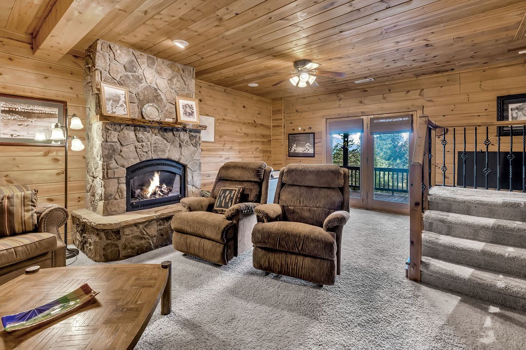 116 Channing Ridge Road Morganton, GA 30560 - Photo 43 of 62 a living room with furniture and a fireplace
