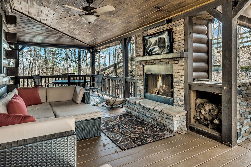 116 Channing Ridge Road Morganton, GA 30560 - Photo 47 of 62 a living room with furniture and a fireplace