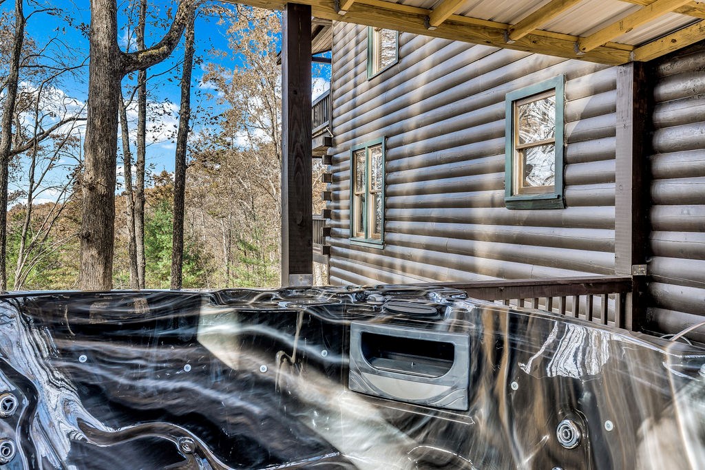 116 Channing Ridge Road Morganton, GA 30560 - Photo 50 of 62 a backyard of a house with chairs