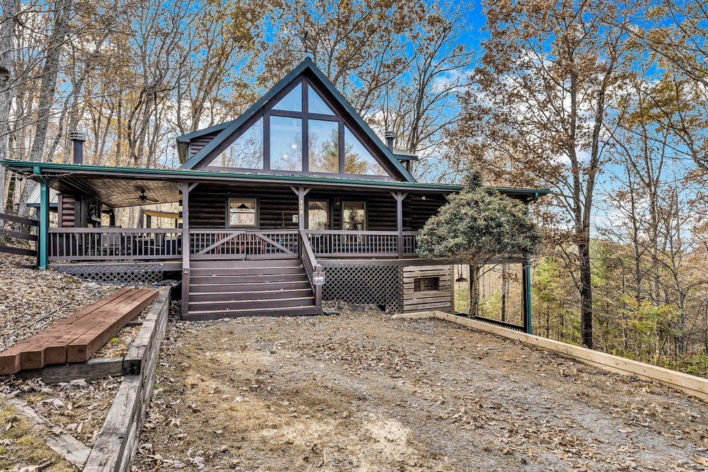 116 Channing Ridge Road Morganton, GA 30560 - Photo 58 of 62 a front view of a house with garden