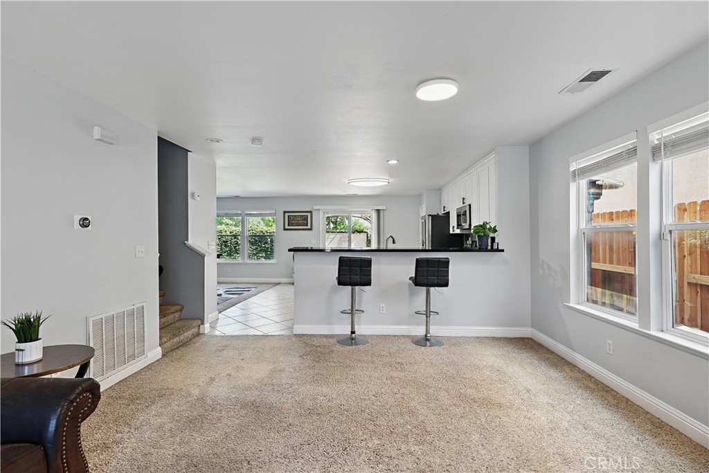1235 Sunrise Drive Merced, CA 95348 - Photo 11 of 44 a living room with furniture and a large window