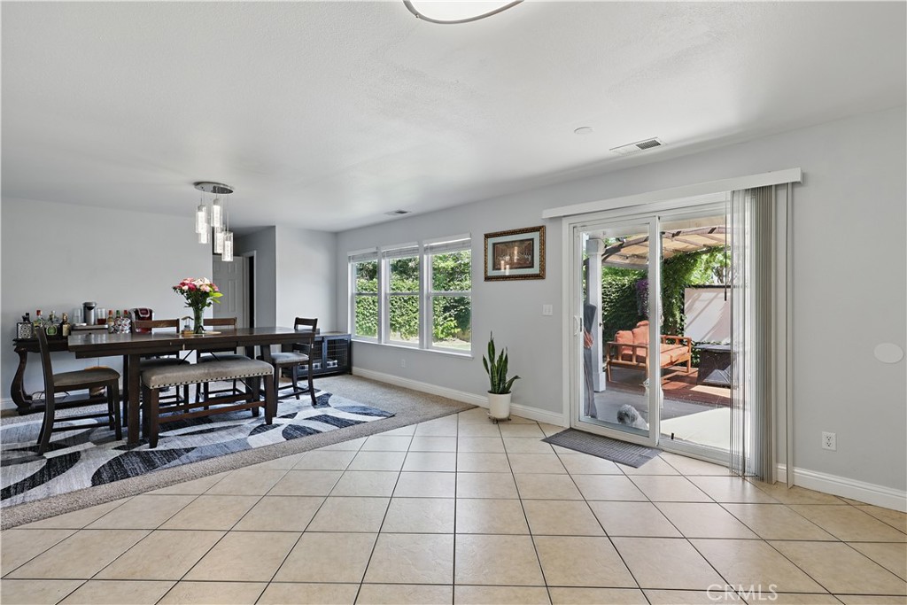 1235 Sunrise Drive Merced, CA 95348 - Photo 13 of 44 a view of a workspace with furniture window and outside view