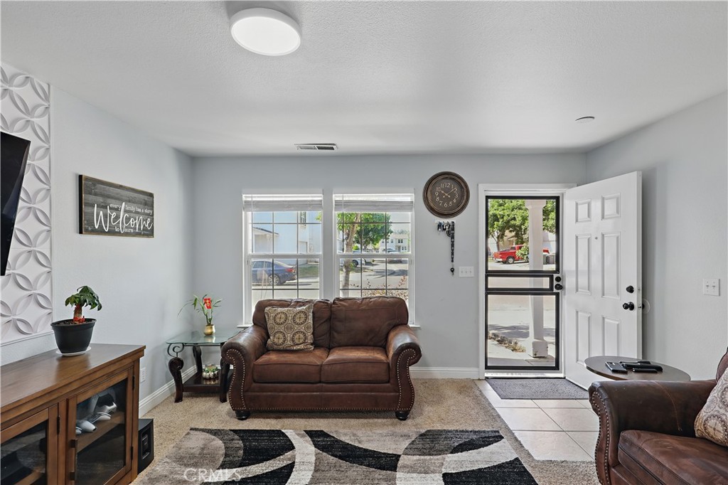 1235 Sunrise Drive Merced, CA 95348 - Photo 16 of 44 a living room with furniture and a window