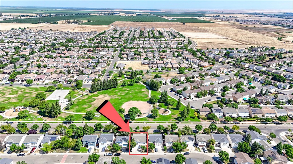 1235 Sunrise Drive Merced, CA 95348 - Photo 2 of 44 an aerial view of beach and residential houses with outdoor space and swimming pool