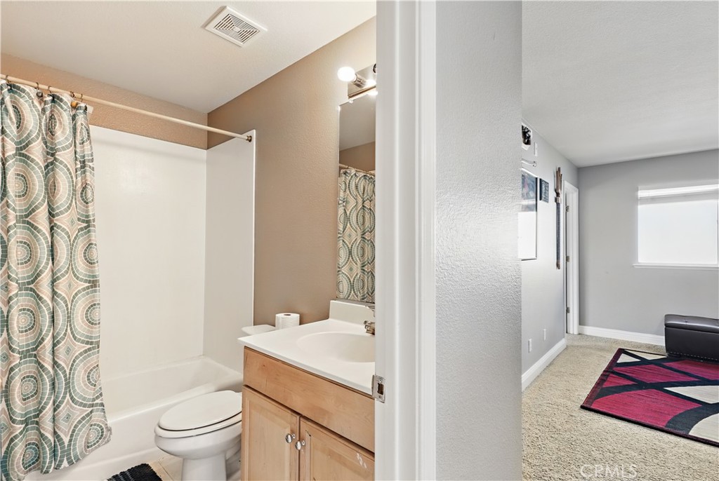 1235 Sunrise Drive Merced, CA 95348 - Photo 35 of 44 a bathroom with a sink toilet and shower