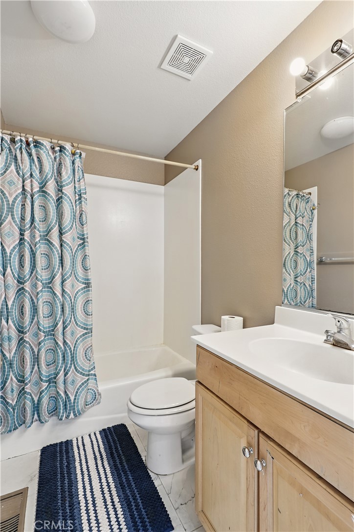 1235 Sunrise Drive Merced, CA 95348 - Photo 36 of 44 a bathroom with a sink a toilet and shower