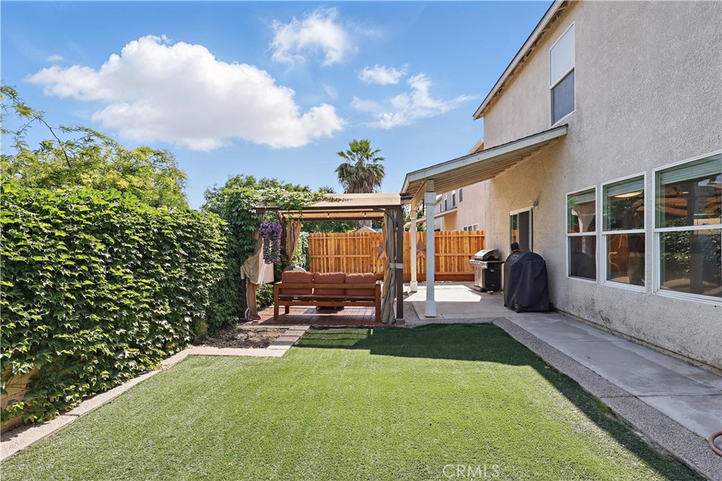 1235 Sunrise Drive Merced, CA 95348 - Photo 38 of 44 a view of a house with backyard and porch