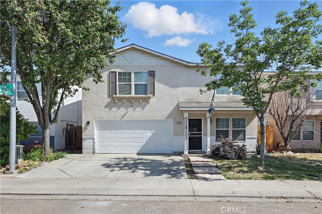 1235 Sunrise Drive Merced, CA 95348 - Photo 44 of 44 a front view of a house with garden