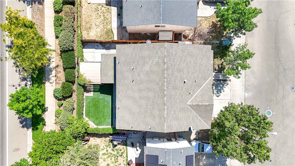 1235 Sunrise Drive Merced, CA 95348 - Photo 8 of 44 an aerial view of a house with yard and seating space