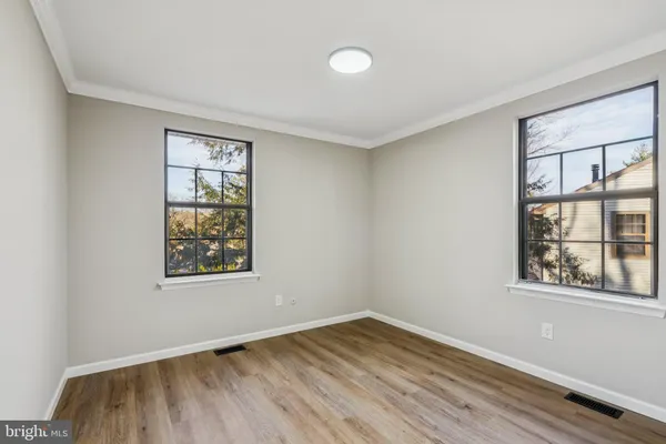 an empty room with windows
