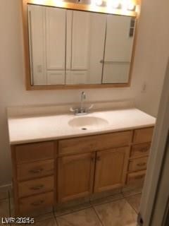 1440 East Vegas Valley Drive, Unit 7 Las Vegas, NV 89169 - Photo 13 of 19 Bathroom with vanity and light tile patterned floors