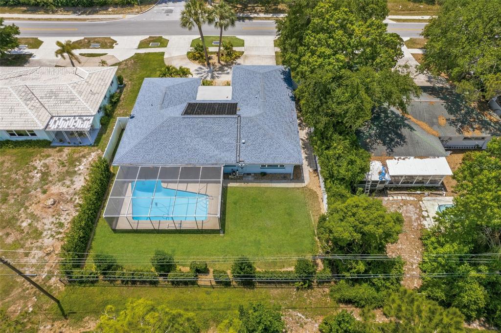 656 Mehlenbacher Road Belleair, FL 33756 - Photo 2 of 49 an aerial view of a house with swimming pool