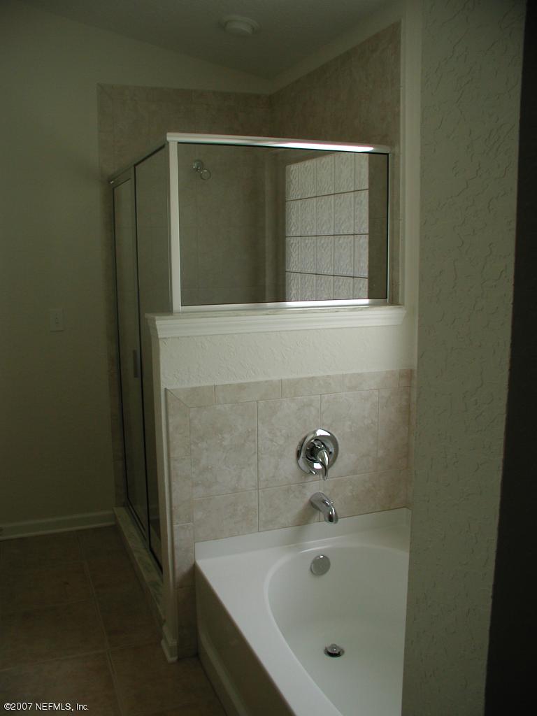 4000 Bronco Road Middleburg, FL 32068 - Photo 7 of 13 a bathroom with a sink