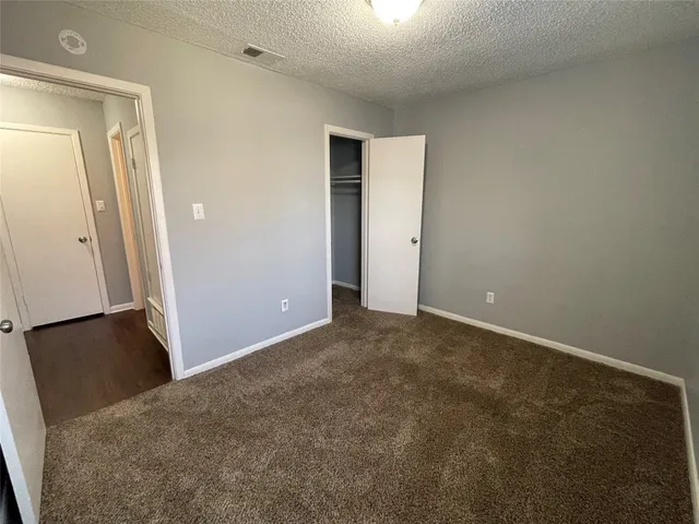 an empty room with closet