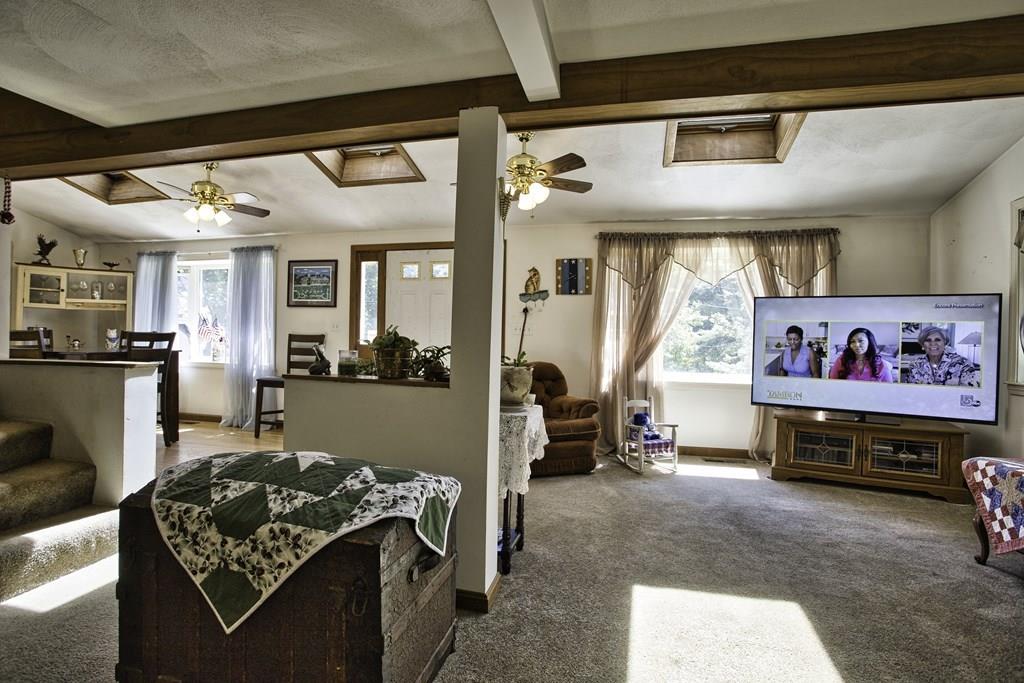 41 Shawsheen Road Billerica, MA 01821 - Photo 7 of 35 a living room with furniture and a flat screen tv