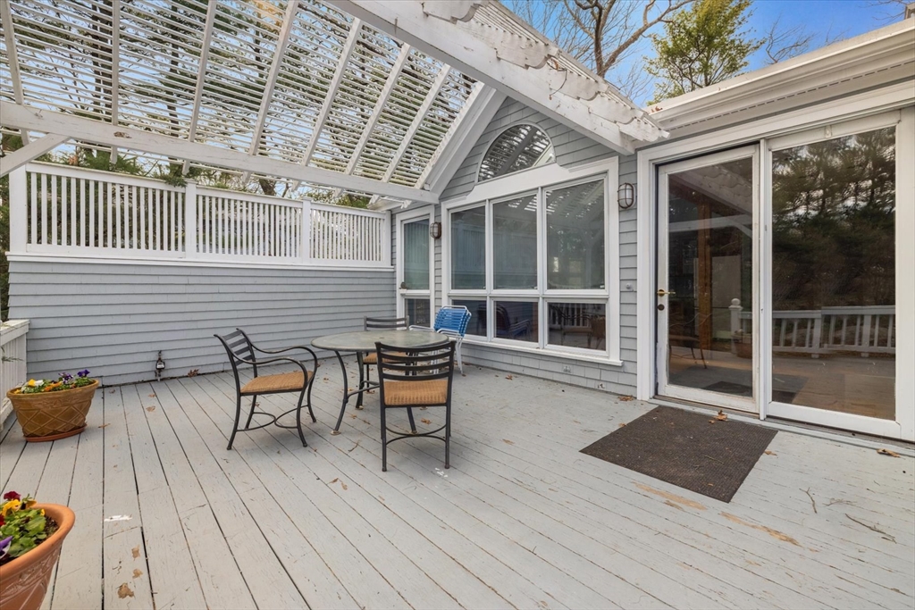 207 Pleasant Street Milton, MA 02186 - Photo 23 of 28 a backyard of a house with seating space