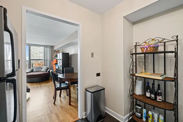 a view of a livingroom with furniture and a flat screen tv