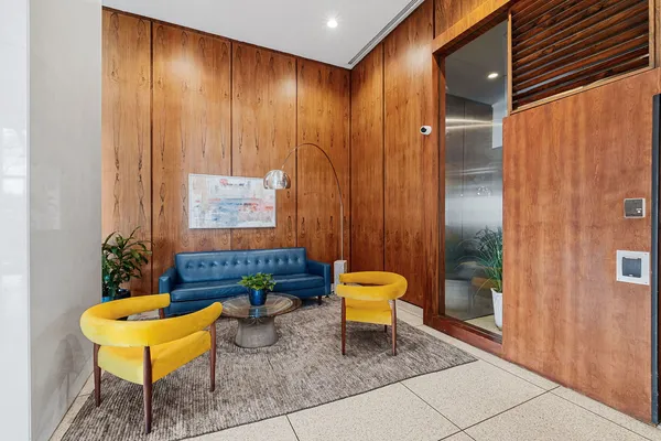 a living room with furniture and a gate