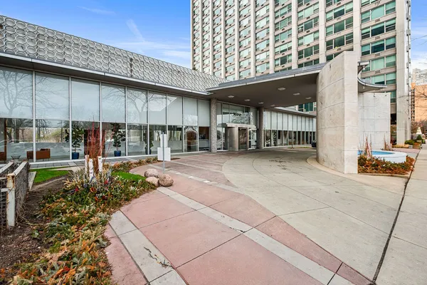 a view of a building with sitting area