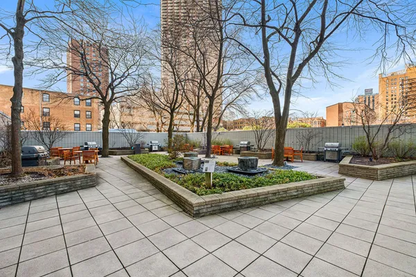 a view of yard with patio