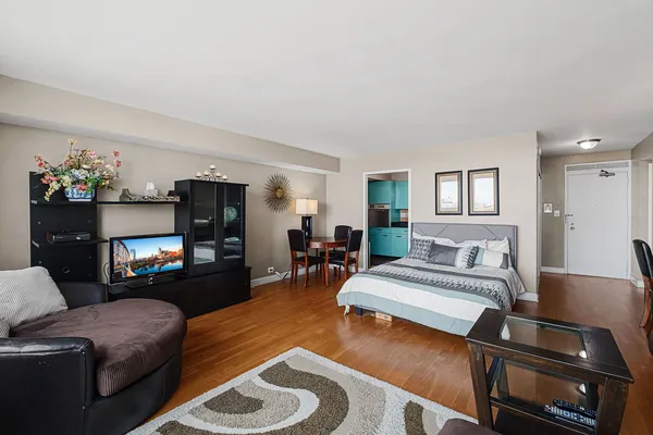 a bedroom with furniture and a fireplace
