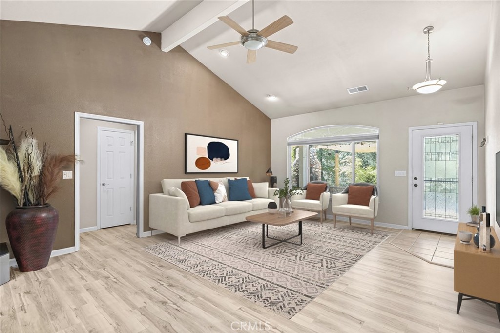 2262 Honey Run Road Chico, CA 95928 - Photo 11 of 74 a living room with furniture and a large window