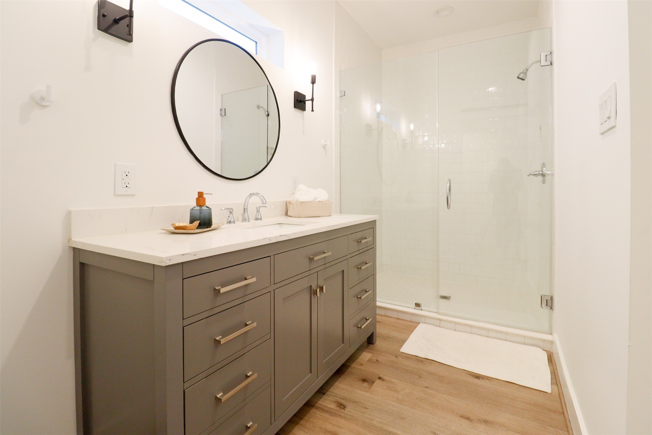 3824 Fulton Street, Unit 102 Houston, TX 77009 - Photo 10 of 16 a bathroom with a sink and a mirror