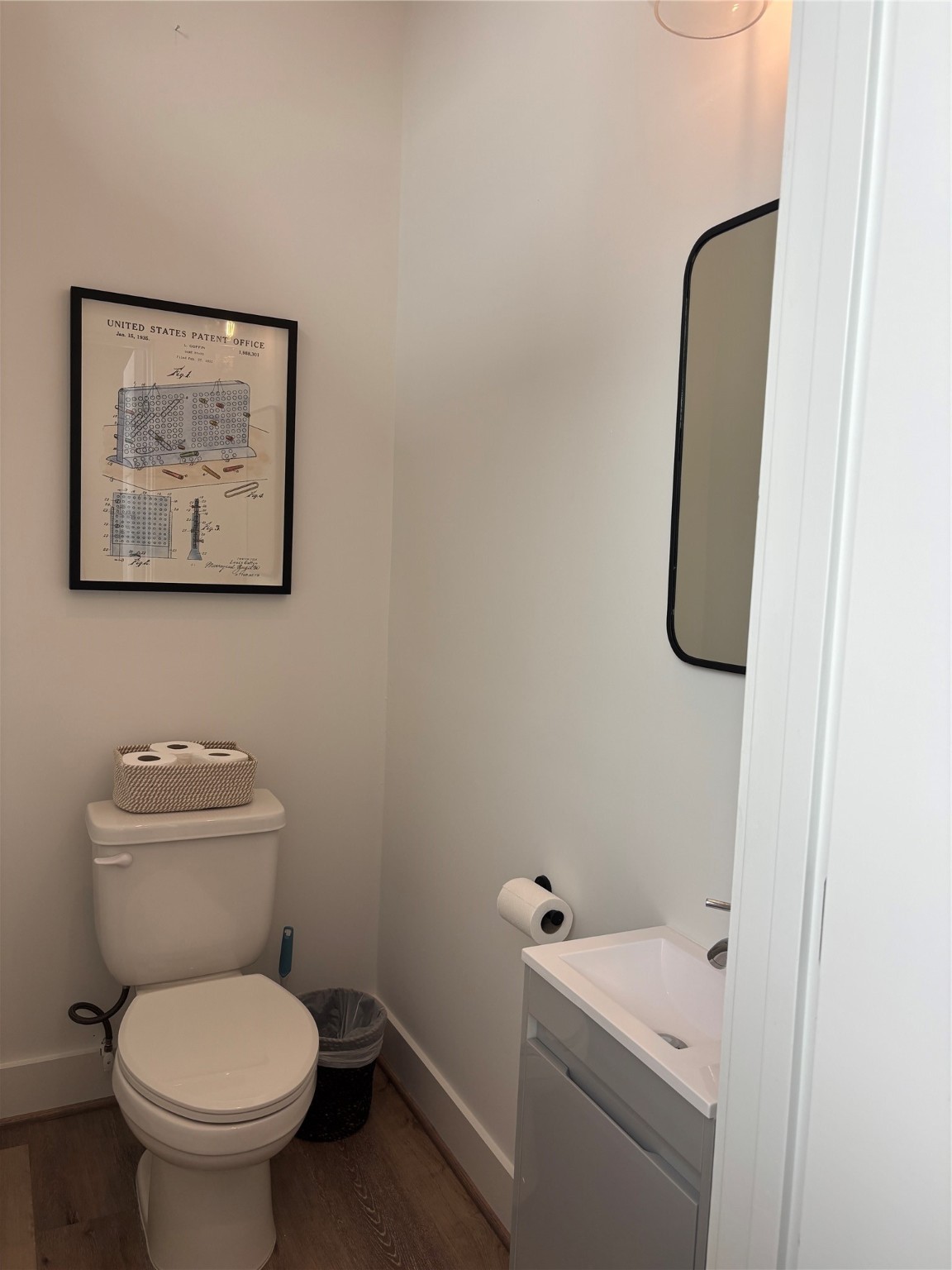 3824 Fulton Street, Unit 102 Houston, TX 77009 - Photo 12 of 16 a bathroom with a toilet and a sink