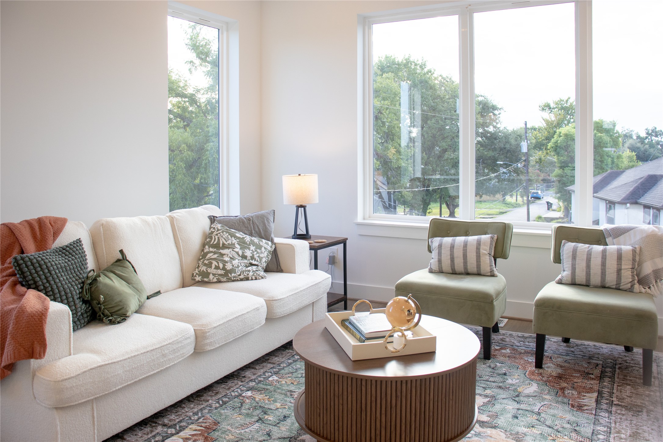 3824 Fulton Street, Unit 102 Houston, TX 77009 - Photo 16 of 16 a living room with furniture and a large window