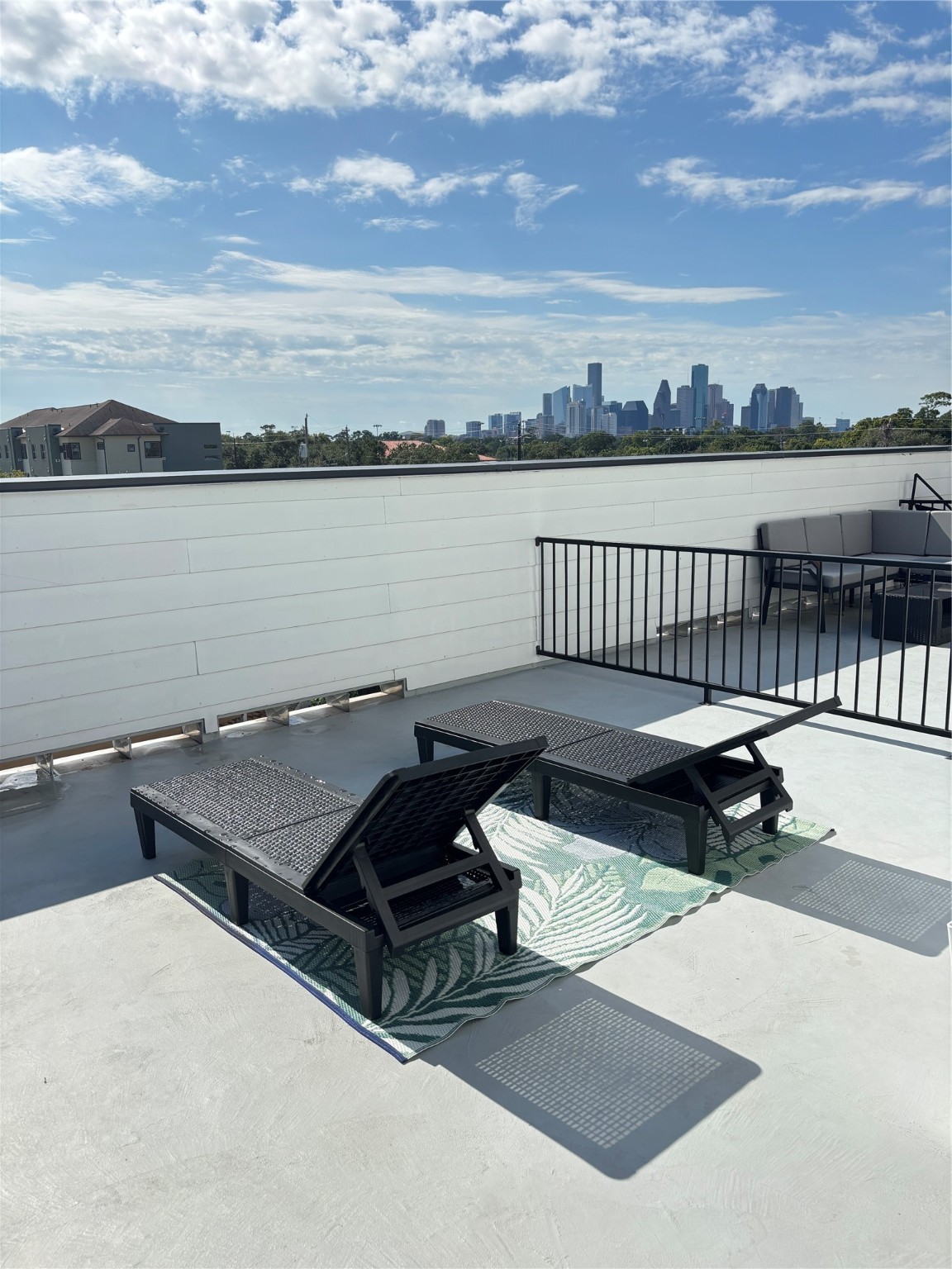 3824 Fulton Street, Unit 102 Houston, TX 77009 - Photo 3 of 16 a view of a terrace with a bench