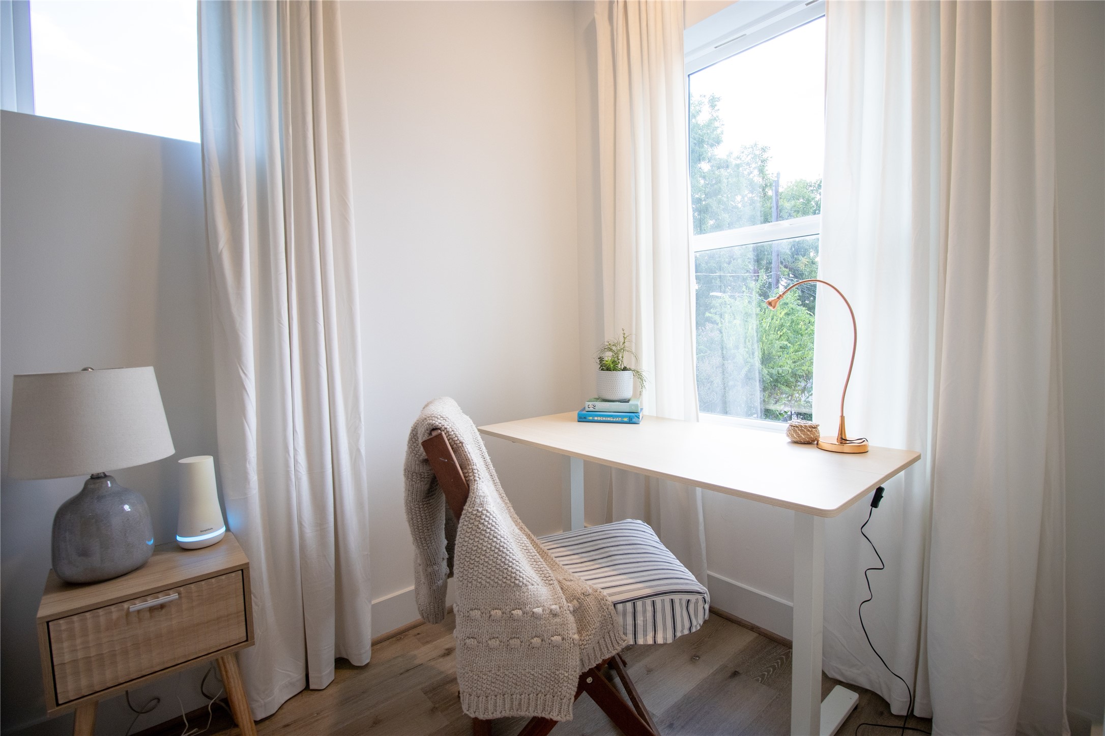 3824 Fulton Street, Unit 102 Houston, TX 77009 - Photo 8 of 16 a dining room with furniture and a window