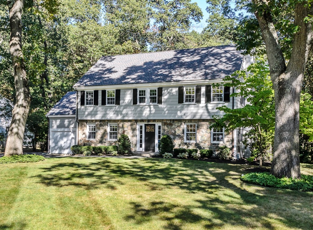 82 Whittier Road Wellesley, MA 02481 - Photo 1 of 28 a front view of a house with a garden
