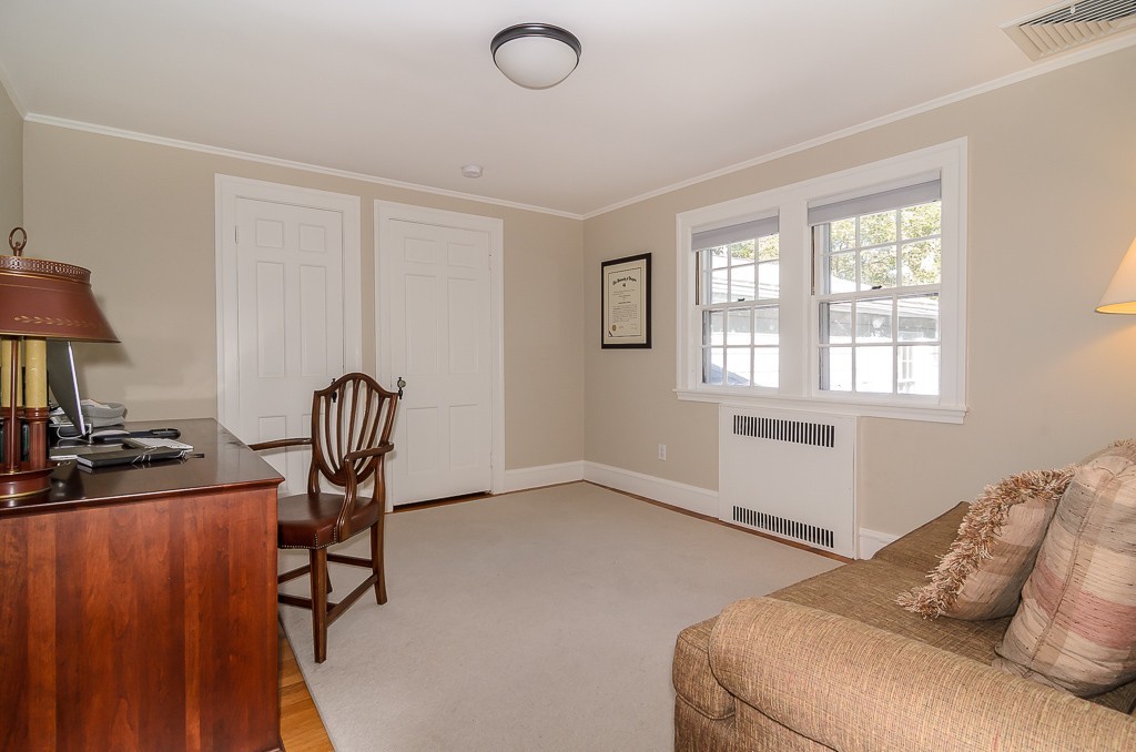 82 Whittier Road Wellesley, MA 02481 - Photo 18 of 28 a bedroom with furniture and a window
