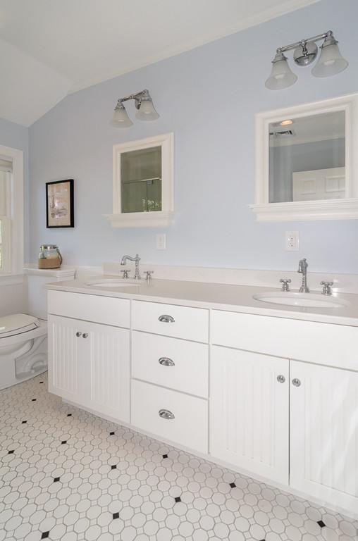 82 Whittier Road Wellesley, MA 02481 - Photo 20 of 28 a bathroom with a sink toilet and mirror