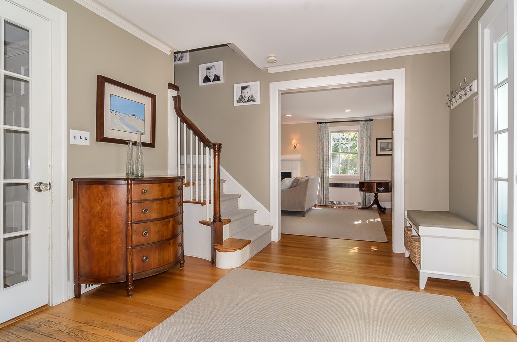 82 Whittier Road Wellesley, MA 02481 - Photo 2 of 28 a view of entryway and hall with wooden floor