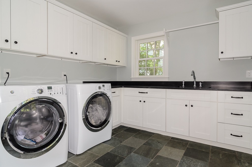 82 Whittier Road Wellesley, MA 02481 - Photo 22 of 28 a utility room with sink dryer and washer