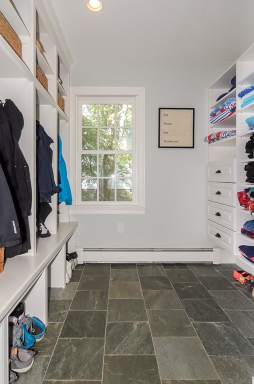 82 Whittier Road Wellesley, MA 02481 - Photo 23 of 28 a view of a livingroom with shelves