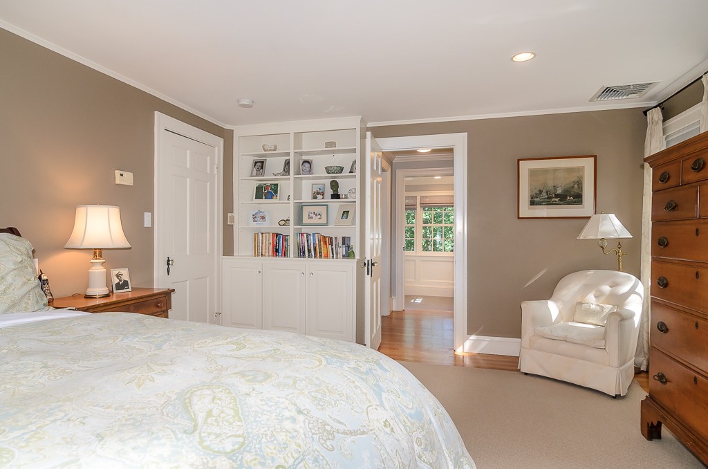 82 Whittier Road Wellesley, MA 02481 - Photo 10 of 28 a bedroom with a bed and a couch